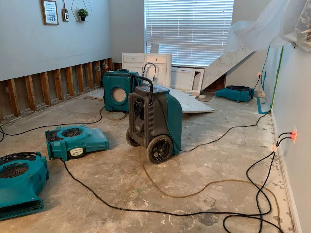 Dehumidifier in flood-cut room for Water Damage Restoration in Lackland AFB